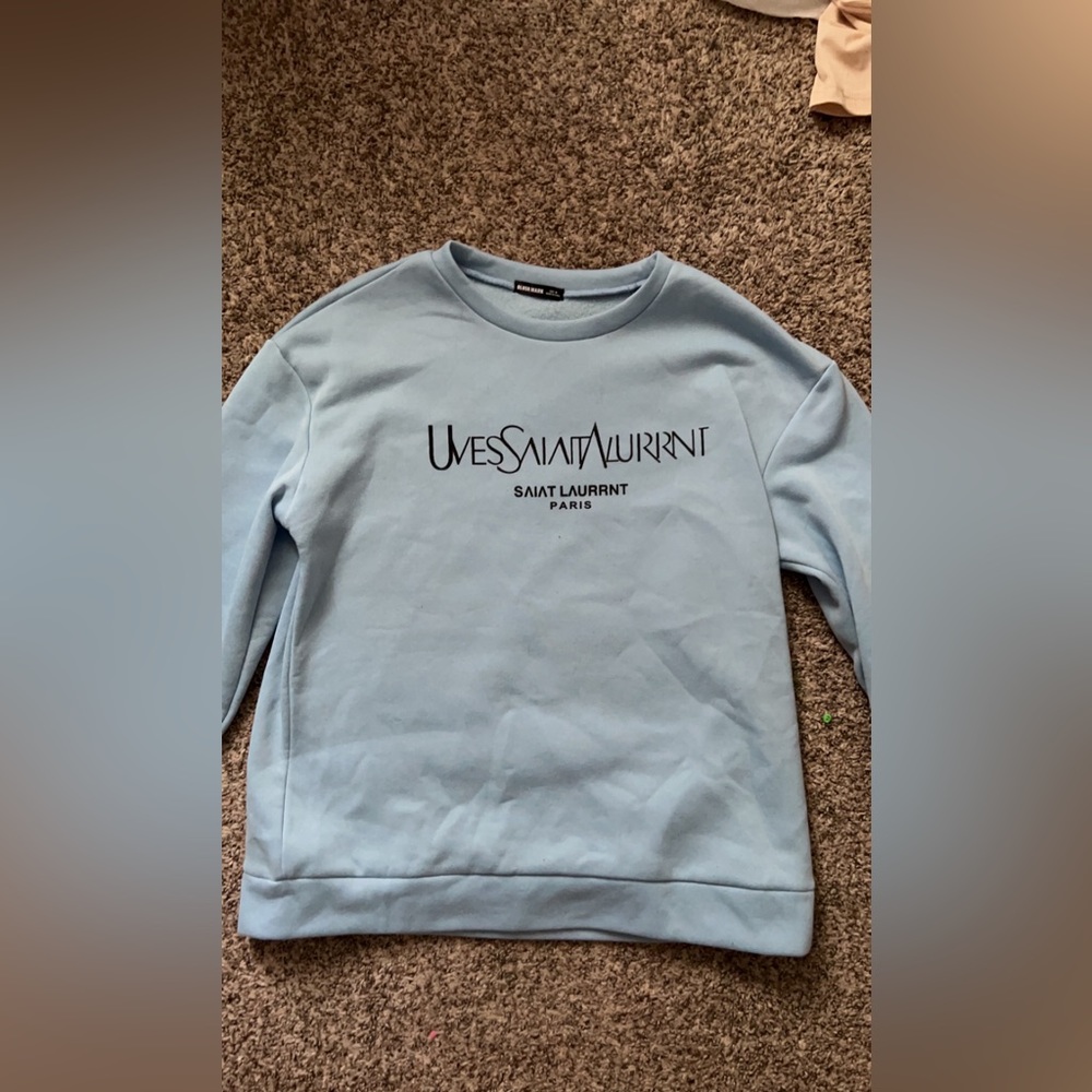 Size medium crew neck sweater.